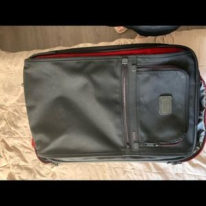 Tumi 22 inch suitcase